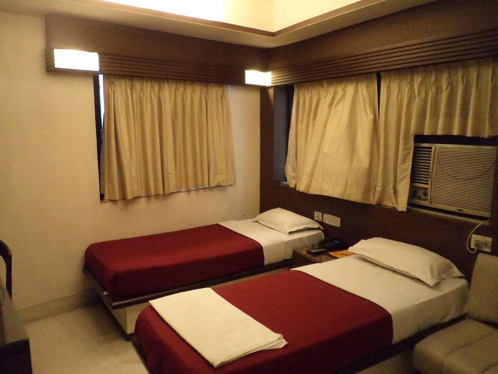 Hotel Aston Калькутта Номер фото