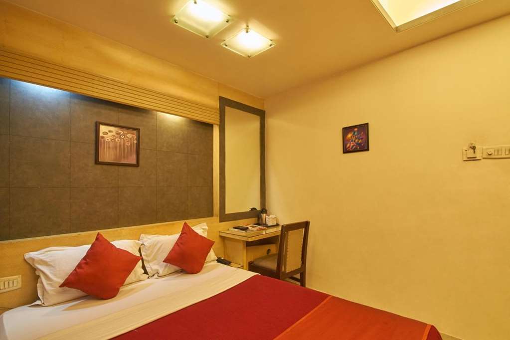 Hotel Aston Калькутта Номер фото